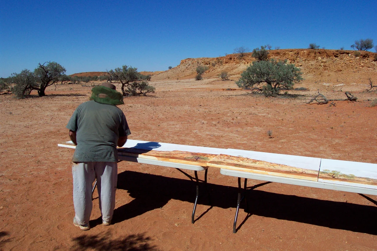 A participant in the ABC TV series "Painting Australia" at Ethabuka Nature Reserve in Wangkamadla country near Bedourie. Ethabuka Station was acquired by the non-profit organisation Bush Heritage Australia in 2004.
