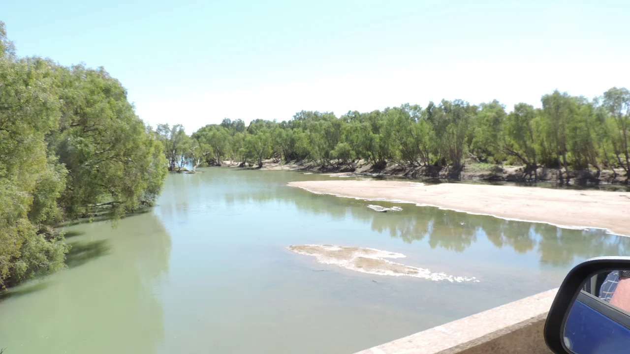 Looking downstream along the Flinders River while crossing on the Burke Developmental Road, Normanton, June 2019