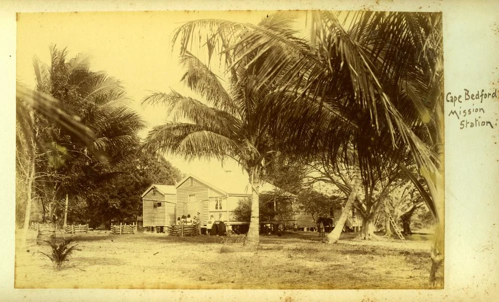 Cape Bedford Mission Station.
Pupils and teachers outdoors at the Cape Bedford Mission, settled by the Lutherans north of Cooktown.