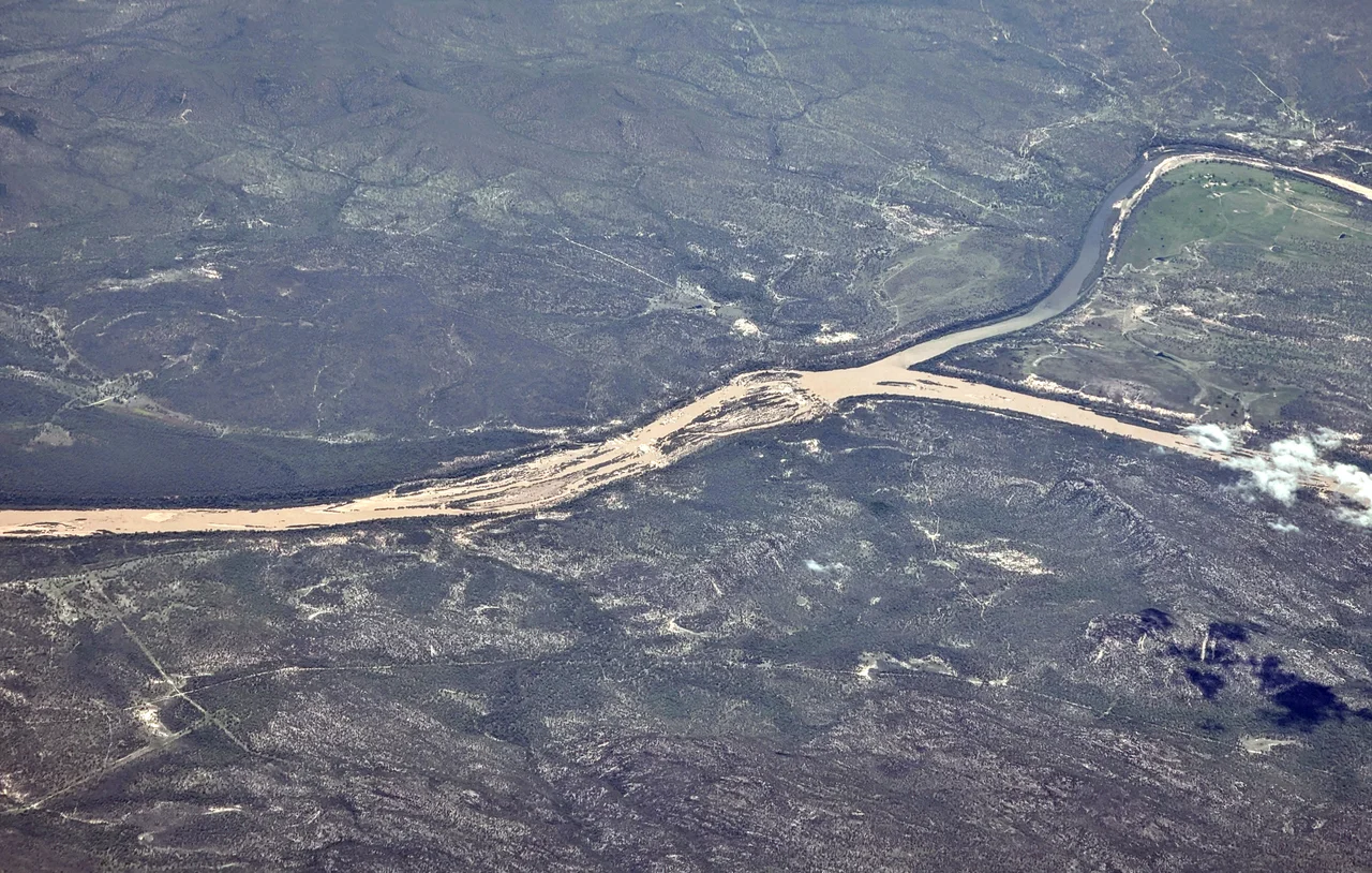 Aerial view of the confluence of the Bowen River (upper) with the Burdekin River, below Burdekin Dam, Queensland, Australia