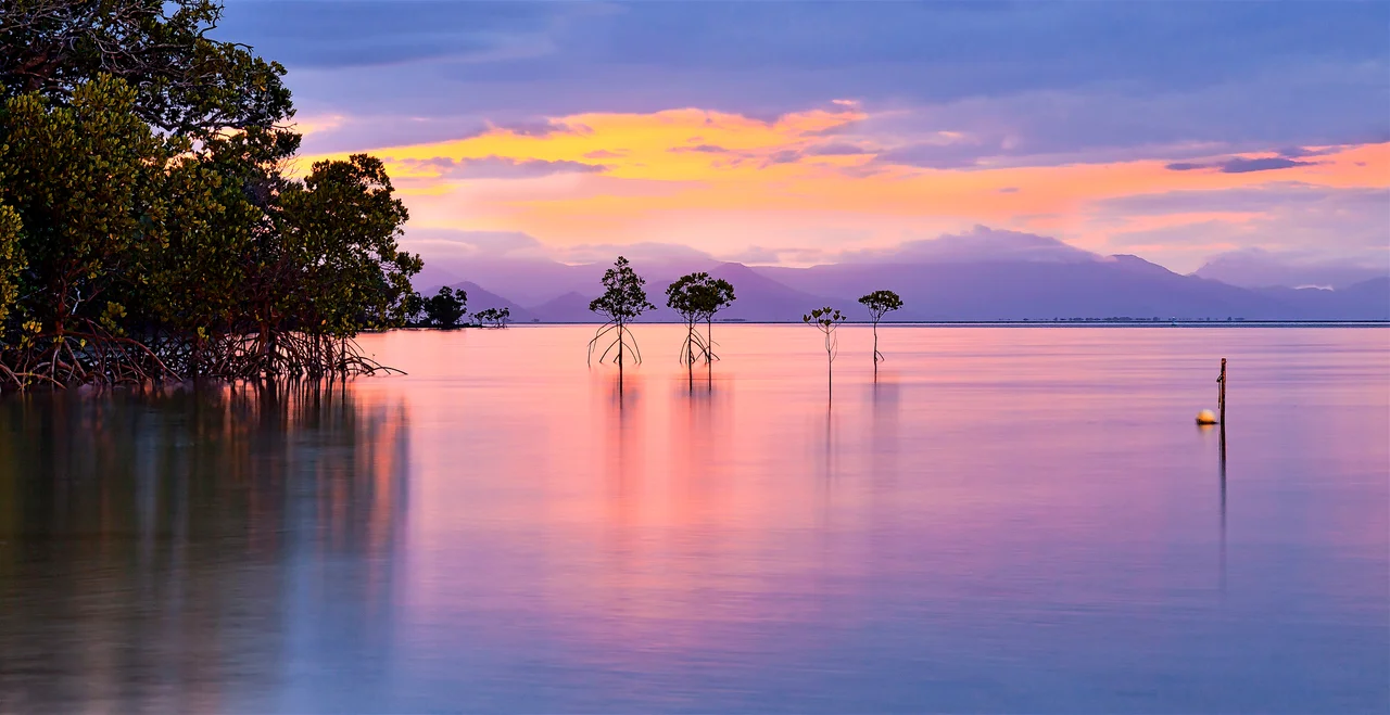 Sunset from the shore on Orpheus Island National Park- James Cook University Research Station. Orpheus Island is part of the Palm Islands and within the Great Barrier Reef World Heritage Area