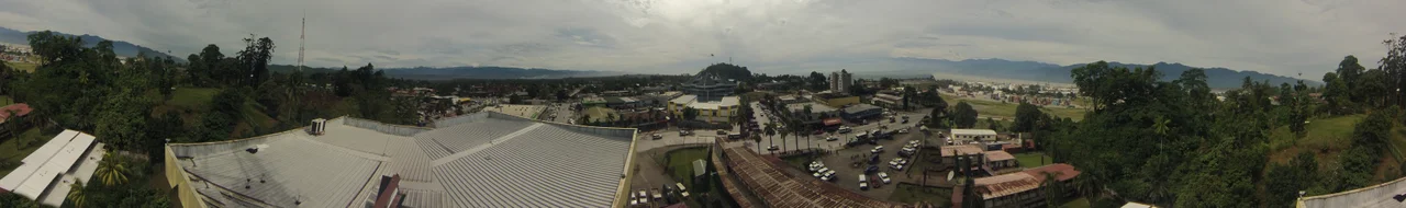 Panoramic photo of Lae city taken from top of the Telikom building, Lae. Governors residence to the left. Port to the right. Taken 29 January 2014