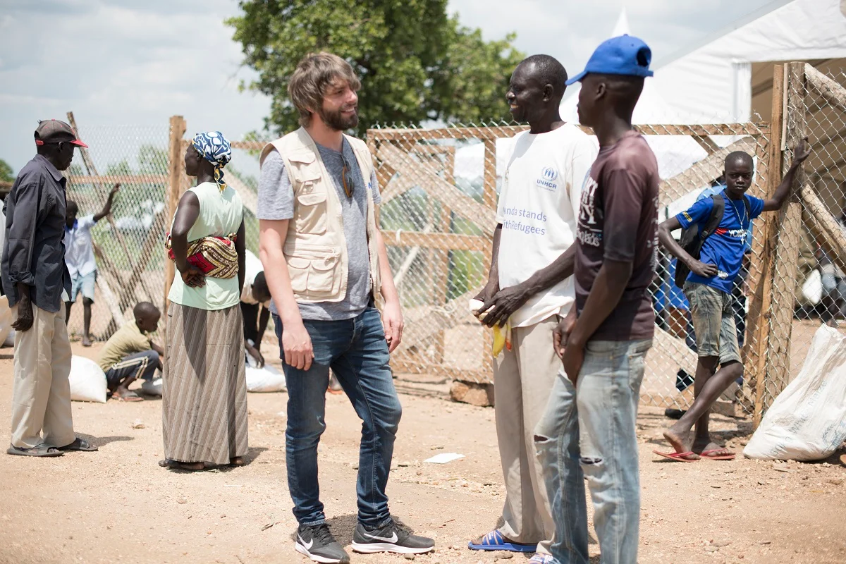 Benson Taylor speaking with South Sudanese refugees at the Bidi Bidi refugee settlement in North Uganda.