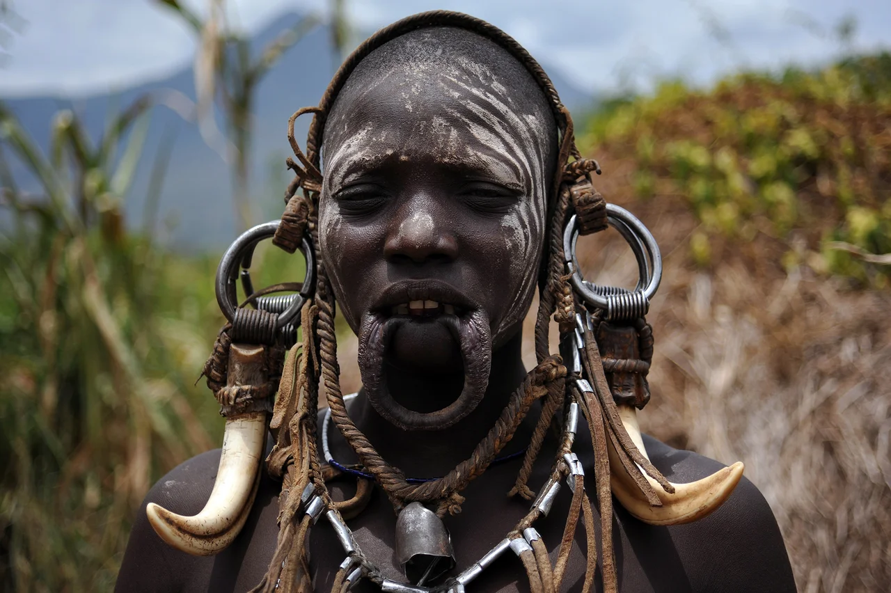 Ethnic Mursi women without her Lip plate at Omo Valley, Ethiopia.