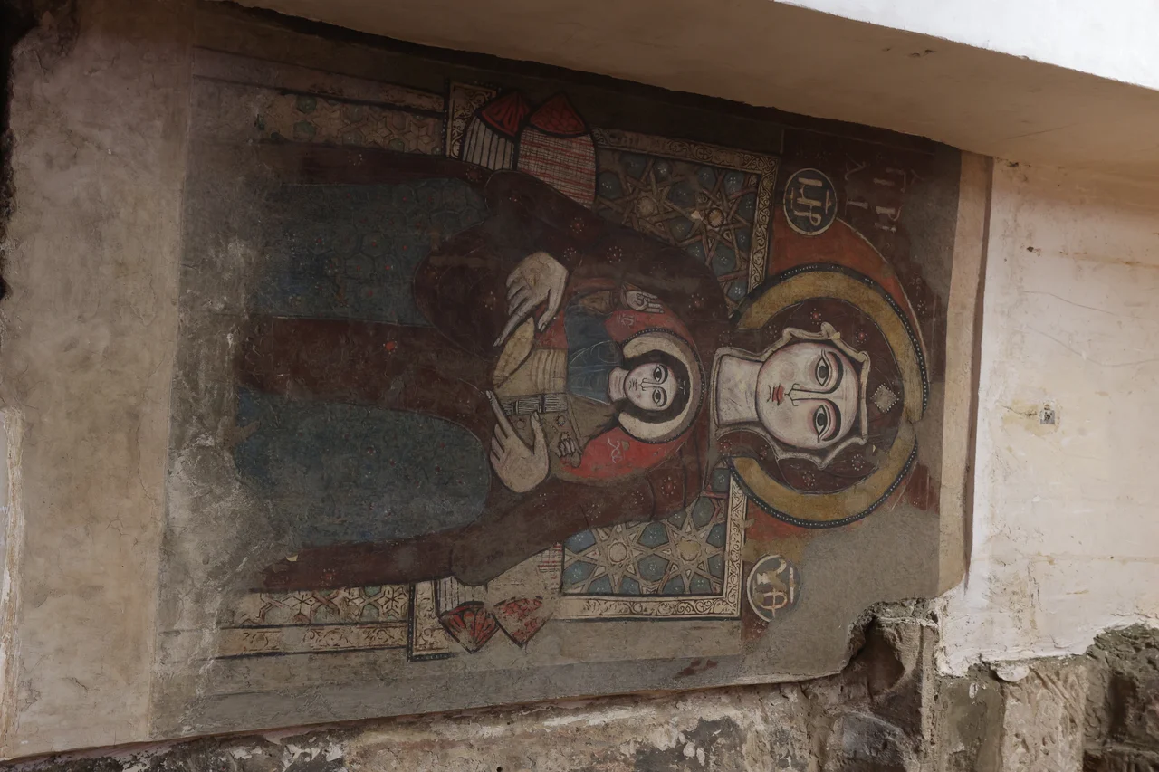 This painting dates from the 14th-century. on the right hand side of the main altar.