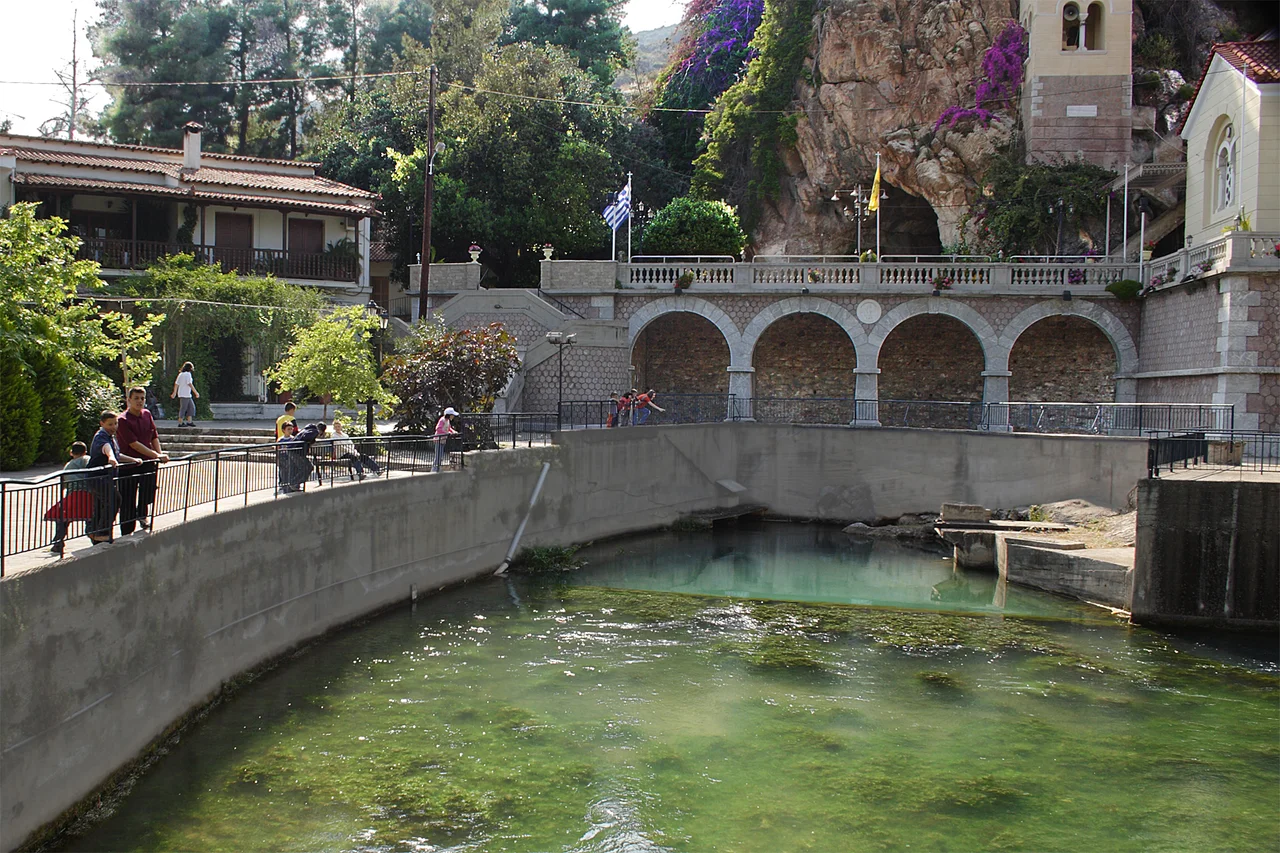 karst spring Kefalari (Argolis, 10 km to the coast and the town Argos). The spring discharge is big, but varies seasonally. According to hydrogeological studies (<1984) the subsurface waterways have two origins: Depression Lake Stymphalia and valley like depression of the regional unit Skoteini-Alea (see Alea, Argolis). The subsurface waterways are fed by old katavothren (καταβόθρα, Greek term for ponor), which drain the depressions, when flooded. This was confirmed by dye tracing. Also see the photo: Image:Alea Argolidas.JPG.
Even in ancient time of Greece  this spring was holy. People in those days suspected, that the water comes from Lake Stymphalia, Spring, cave (60 m, geologically a former waterway), the modern orthodox pilgrimage “Zoodochos Pigi” and the church “Panagia Kefalariotissa” form todays sight.