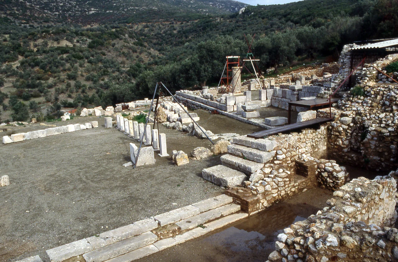 Sanctuary of Apollo Maleatas at Epidauros in 1990. East end of terrace and shrine of the Muses from the southwest.