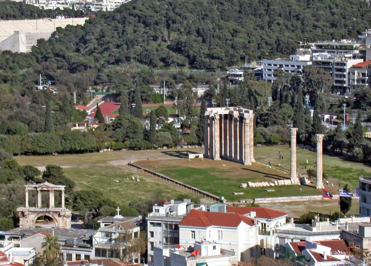 Athens, Greece. Panorama from the top of Mount Lycabettus, looking southwest. Visible sites on the right part of photo: the Panathinaiko Stadium, the Temple of Olympian Zeus, the Hellenic Parliament, the Syntagma Square, the Acropolis and the Parthenon.