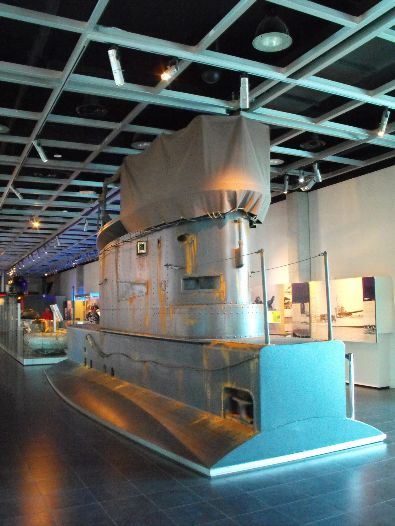A replica of the conning tower of Australian submarine AE2, on display at the Western Australian Maritime Museum. The starboard side of the replica (depicted) shows the submarine as she looked in service