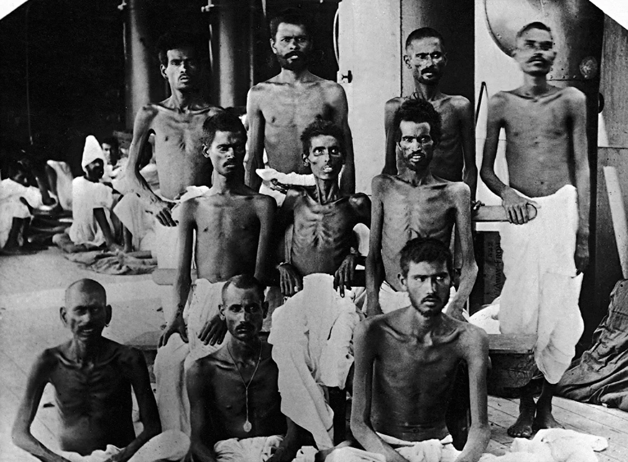 On 15 December 1915 a British expeditionary force was besieged by a strong German-led Turkish army at Kut Al Amara on the Tigris River. The garrison, two thirds of which was Indian, surrendered on 29 April 1916. During the ensuing period of captivity in Anatolia many died from heat, disease and neglect. These emaciated men were photographed after they had been liberated during an exchange of prisoners.