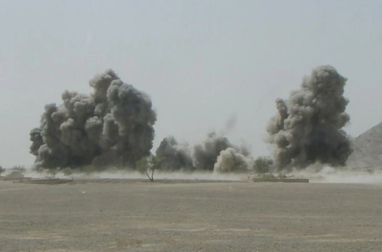 Smoke billows from a 500-pound bomb dropped during the intense battle for the city of Shewan. During the battle, Marine snipers attached to Task Force 2d Battalion, 7th Marine Regiment, Special Purpose Marine Air Ground Task Force Afghanistan, killed more than 50 insurgents and wounded several more.