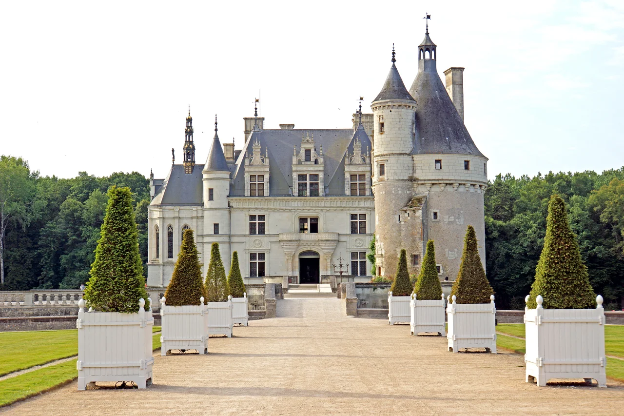 Château de Chenonceau spans the River Cher, near the small village of Chenonceaux. It is one of the most well-known châteaux of the Loire valley. The current château was built in 1514-1522 on the foundations of an old mill and was later extended to span the river. The bridge over the river was built between 1556-1559.
The original château was torched in 1412 by King Charles VII to punish owner Jean Marques for supporting the Duke of Bourgogne and the English.

The son built a new château and fortified mill on the site. He sold the castle to Thomas Bohier in 1513 who destroyed the castle, though its 15th-century keep was left standing. He then built an entirely new residence between 1514 and 1522, much of what we see today.