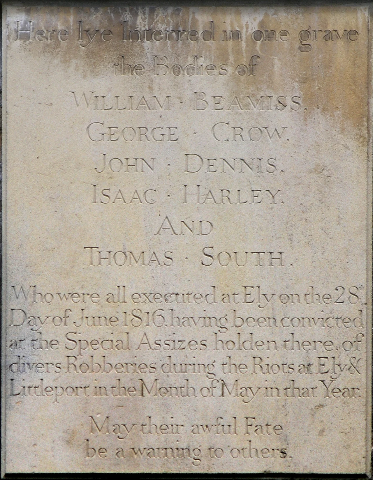 Memorial plaque, on the south wall of the tower of St Mary's Church, Ely, to the five executed Ely and Littleport rioters, 28 June 1816