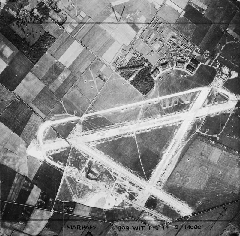 Aerial photograph of RAF Marham, Norfolk, England, from 14,000ft a few months after upgrade to concrete runways in April 1944.