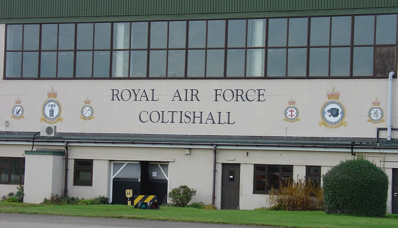 Image of the various badges painted on the central aircraft hangar.  These depict the final 'full capacity' status of RAF Coltishall.  From left to right: No. 6 Squadron RAF, RAF Coltishall station badge, No. 16 Squadron RAF, No. 41 Squadron RAF, No1 Group Headquarters RAF, No. 54 Squadron RAF.
I personally took this digital photograph.  I submit it freely for use on Wikipedia, and educational purposes.