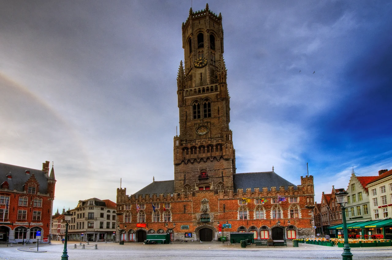 Please take a large   view!
Bruges (Dutch: Brugge) is the capital and largest city of the province of West Flanders in the Flemish Region of Belgium. It is located in the northwest of the country.
The historic city centre is a prominent World Heritage Site of UNESCO. It is egg-shaped and about 430 hectares in size. The area of the whole city amounts to more than 13,840 hectares, including 193.7 hectares off the coast, at Zeebrugge ("Seabruges" in literal translation). The city's total population is more than 117,000, of which around 20,000 live in the historic centre.
Bruges has, because of its port, a significant economic importance and is also home to the College of Europe.

From Wikipedia, the free encyclopedia