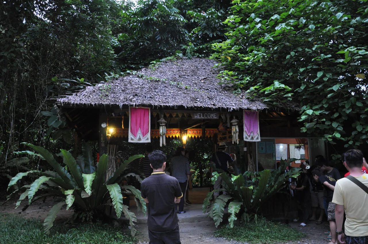 The next halt and the last halt for the day was the Mari Mari Cultural village. Seen here is the entrance hut and ticket office of the park, set in the fading evening light. The village, is actually a theme park of sorts which introduces you to various traditional homes of Sabahan ethnic communities—the Bajau, Lundayeh, Murut, Rungus and Dusun—which are built by descendants of the tribes which they represent. (Kota Kinabalu, East Malaysia, Nov. 2013)