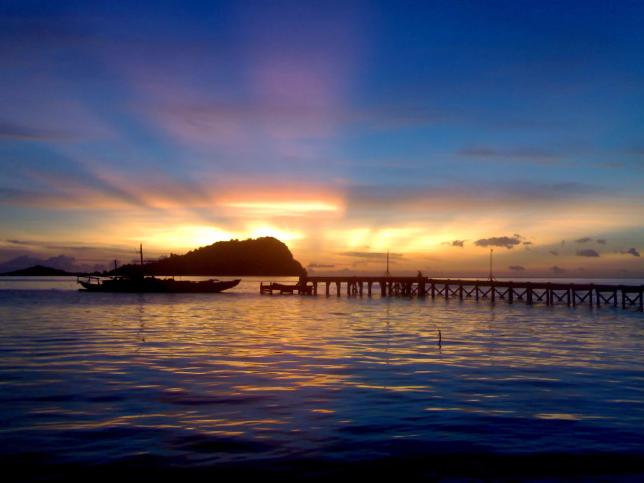 Sunset above island hills of PDC Kabucan taken from PDC Bangas, HPT, Sulu. Bangsamoro.